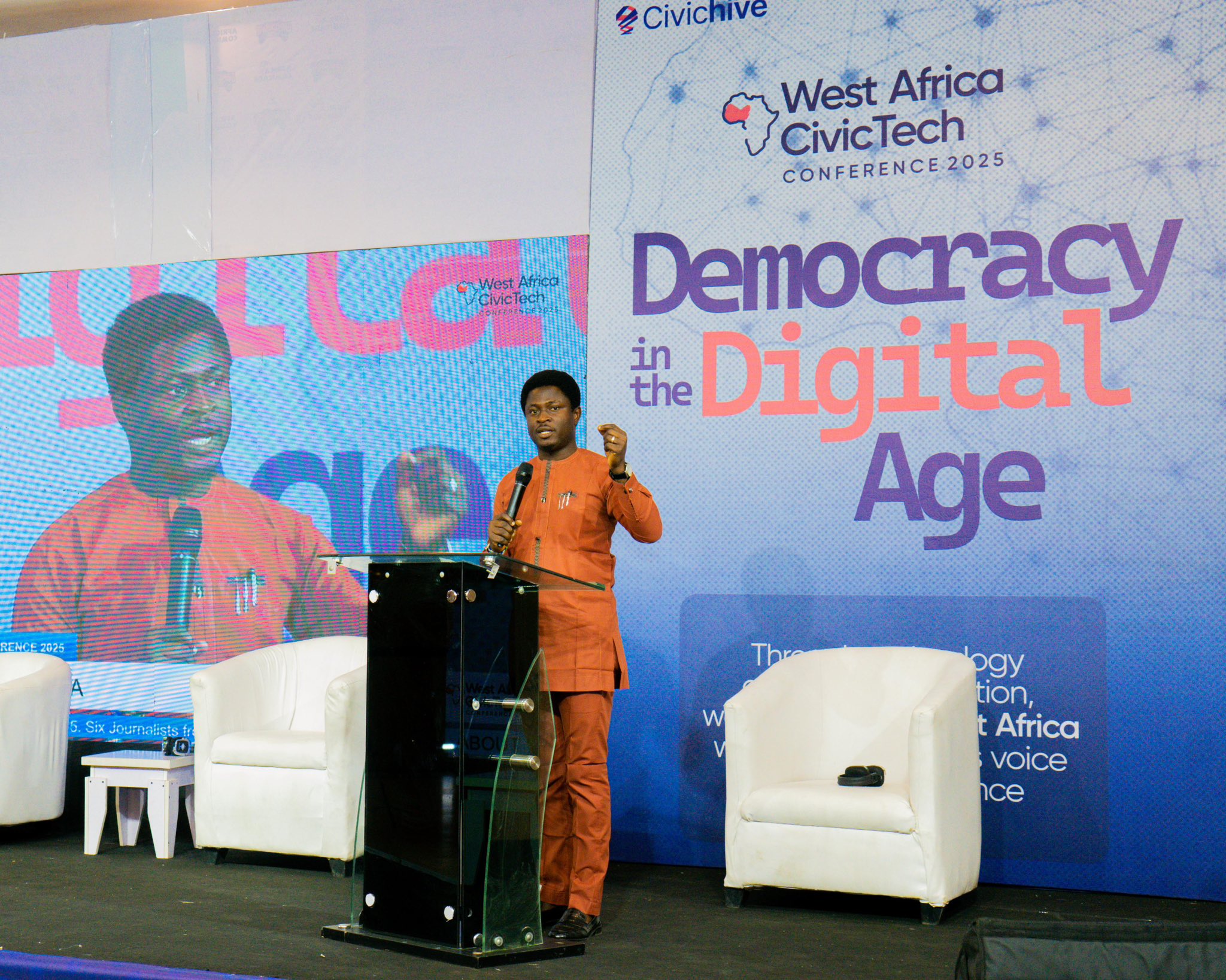 A young man from Ominira Initiative presenting at the West Africa Civic Tech Conference in Nigeria